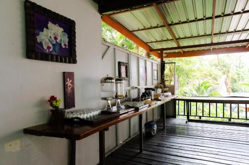 a room with a counter with some food on it at The Vatika Resort and Spa in Ao Nang Beach
