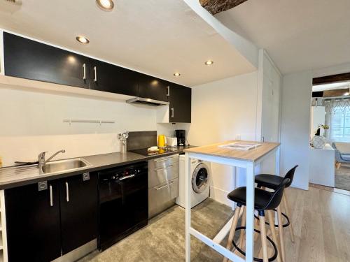 Køkken eller tekøkken på Le Saint Georges avec terrasse, Hyper centre ville