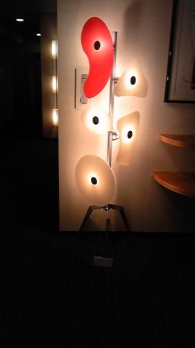 a wall with a bunch of lights on it at Hotel Estacion Hikone in Hikone
