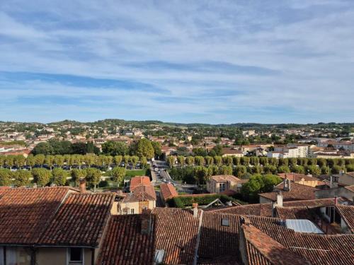 an aerial view of a town with roofs at T2 moderne hypercentre - vue imprenable sur la ville in Auch
