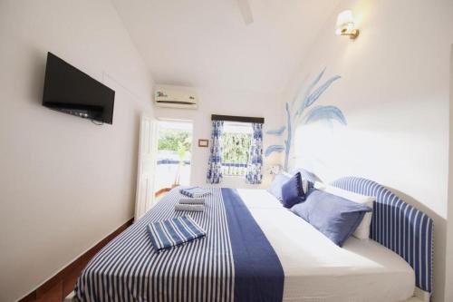 Dona Sa Maria Eco Hotelにあるベッド