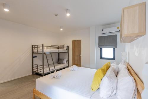 Cama o camas de una habitación en Studio 365 Serviced Apartments