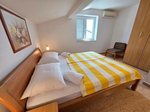 Ένα ή περισσότερα κρεβάτια σε δωμάτιο στο TOM V NV Apartment with sea view, 250m from the beach