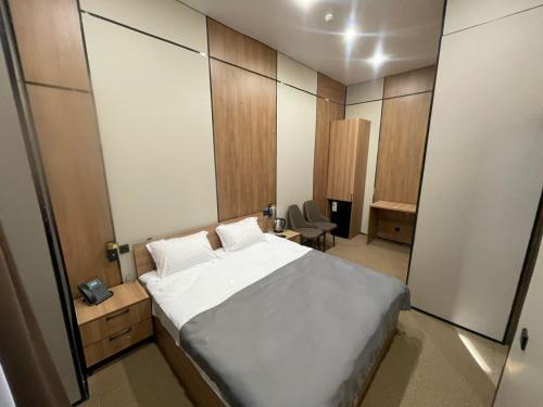 Ένα ή περισσότερα κρεβάτια σε δωμάτιο στο AIRIS Residence