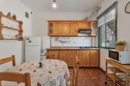 Η κουζίνα ή μικρή κουζίνα στο Apartamento Nayara C