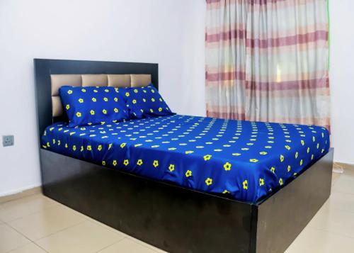 Postel nebo postele na pokoji v ubytování Duplex in Lagos