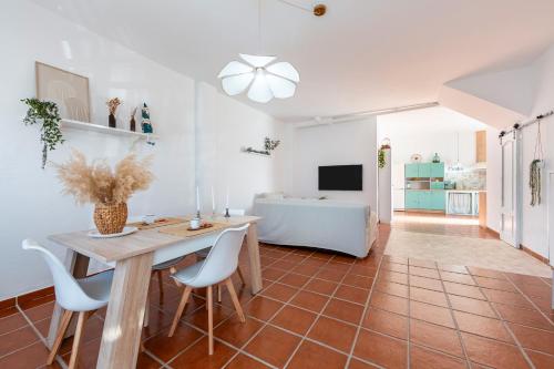 Una televisión o centro de entretenimiento en Apartamento Calma Suite