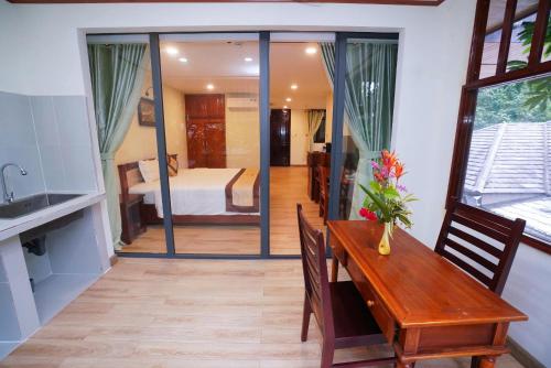 Postel nebo postele na pokoji v ubytování Vela Phu Quoc Resort
