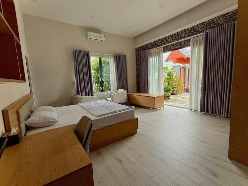 Postel nebo postele na pokoji v ubytování Bao Ong Thien Retreat - Khu Nghỉ Dưỡng Bào Ông Thiền