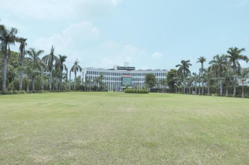 Κήπος έξω από το HOTEL MENAAL RESIDENCY