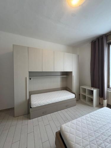 En eller flere senge i et værelse på Locazione turistica La casa dei limoni