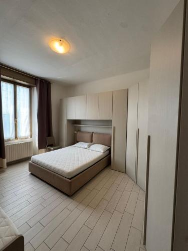 En eller flere senge i et værelse på Locazione turistica La casa dei limoni