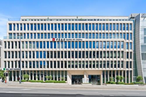 a building with a sign on the front of it at Voya Residence Zenit Royal - Luxury Apart Hotel Rooftop Views & Concierge in Luxembourg