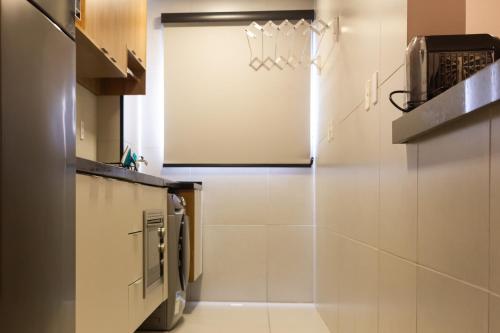 Η κουζίνα ή μικρή κουζίνα στο Loft Super Aconchegante