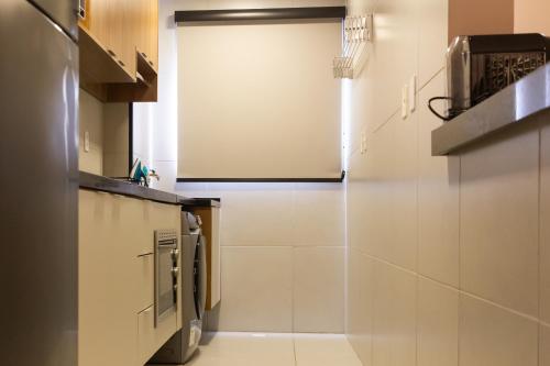 Η κουζίνα ή μικρή κουζίνα στο Loft Super Aconchegante
