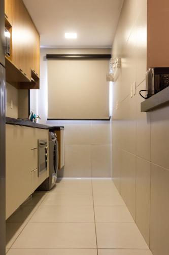 Η κουζίνα ή μικρή κουζίνα στο Loft Super Aconchegante