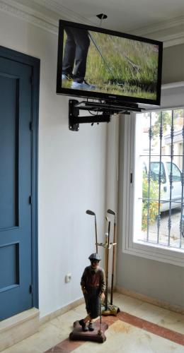 TV a/nebo společenská místnost v ubytování Hostal Drago