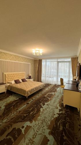 Ένα ή περισσότερα κρεβάτια σε δωμάτιο στο Hotel Misto SPA & FITNESS