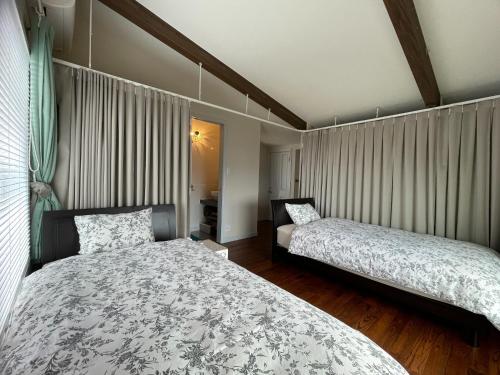 Giường trong phòng chung tại Joy House - Vacation STAY 17943v