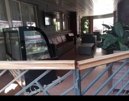 a view of a living room from a balcony at elon moreh in Lusaka