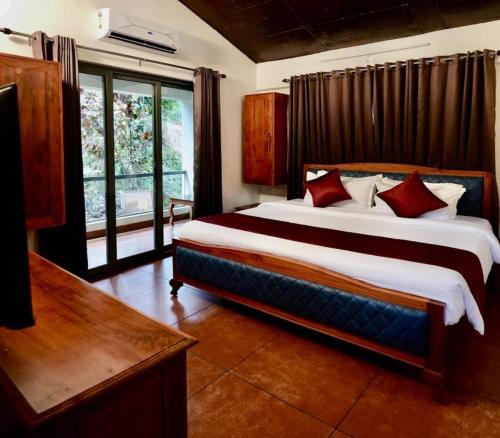 Postel nebo postele na pokoji v ubytování ByTheLakeResort