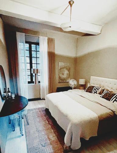 Ένα ή περισσότερα κρεβάτια σε δωμάτιο στο Dreamhome B&B Limoux