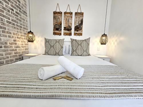Ένα ή περισσότερα κρεβάτια σε δωμάτιο στο Leopard Tree Lodge