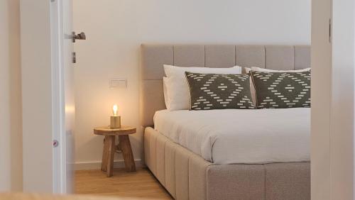 En eller flere senge i et værelse på A Proa do Moliceiro DOCA Terrace Barra Beach