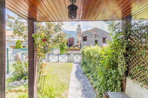 an outside view of a house with a garden at Mountain Escape for Families & Friends in Pyrenees in Fiscal