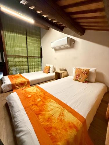 Una cama o camas en una habitación de 校長的家The Principal Home