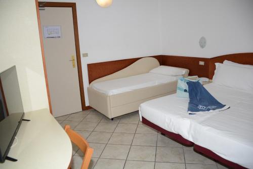 Postel nebo postele na pokoji v ubytování B&B Isabella