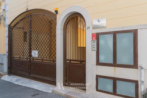 a pair of doors on the side of a building at Wanderlust Experience La Casetta in Bitonto