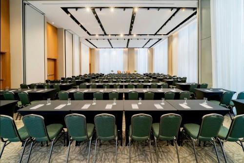 a large room with tables and chairs in it at The Westin Sao Paulo in Sao Paulo
