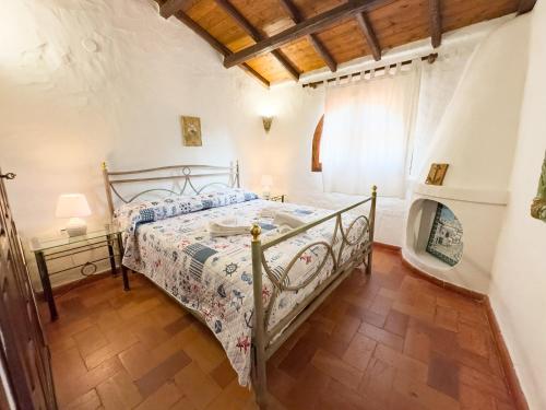 Katil atau katil-katil dalam bilik di Villa dei Pirati, sulla spiaggia di Campus