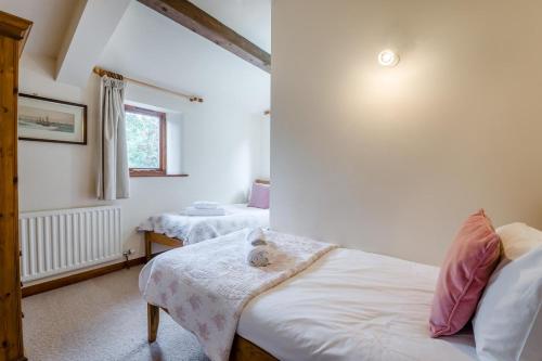 Postel nebo postele na pokoji v ubytování 3 Bed in Hawes oc-r33123
