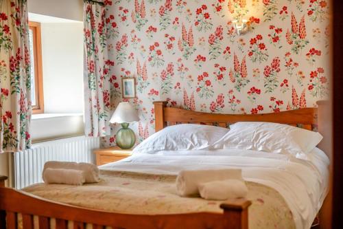 Ένα ή περισσότερα κρεβάτια σε δωμάτιο στο 4 Bed in Hawes oc-g33122