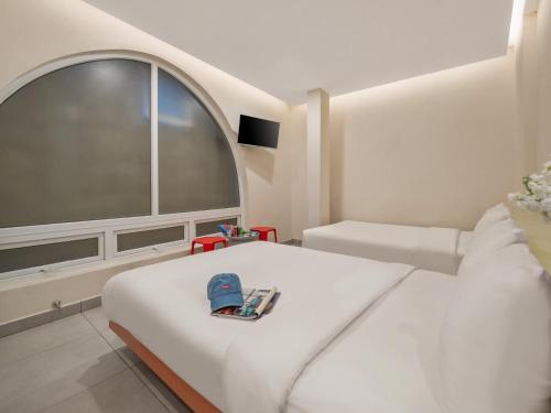 Телевизор и/или развлекательный центр в Bazan Dalat Hotel