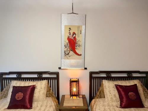 Postel nebo postele na pokoji v ubytování Da Fu Di B&B