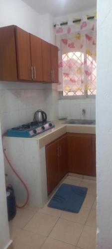 Nhà bếp/bếp nhỏ tại Mafric homes 1bedroom apartments