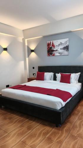 Postel nebo postele na pokoji v ubytování The Dalton Grand Hotel