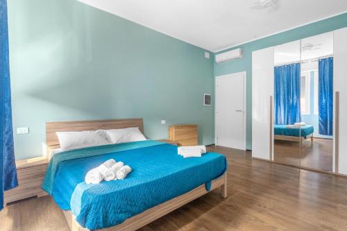 Postel nebo postele na pokoji v ubytování new cozyflat free wifi e AC 7 min Rho fiera
