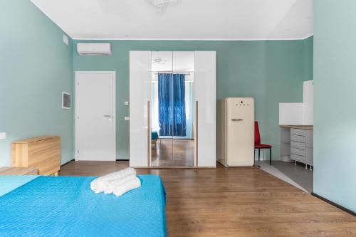 Postel nebo postele na pokoji v ubytování new cozyflat free wifi e AC 7 min Rho fiera
