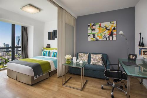 Ένα ή περισσότερα κρεβάτια σε δωμάτιο στο Citadines Xinghai Suzhou