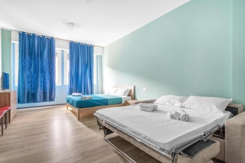 Postel nebo postele na pokoji v ubytování new cozyflat free wifi e AC 7 min Rho fiera