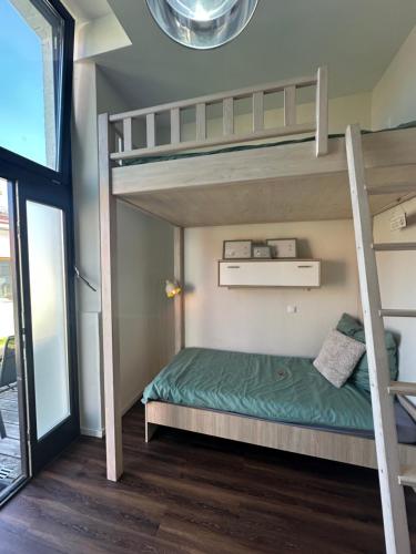 Ένα ή περισσότερα κρεβάτια σε δωμάτιο στο Gemütliche City Wohnung mit Terrasse 4 Betten