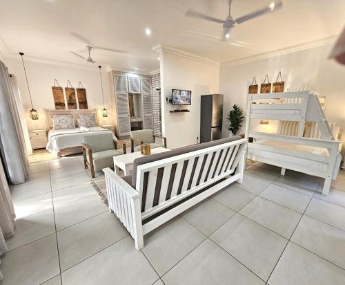 Ένα ή περισσότερα κρεβάτια σε δωμάτιο στο Leopard Tree Lodge