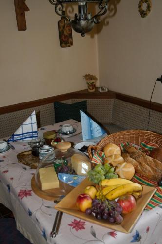 a table with a bunch of food on it at Landhaus Greiderer in Kössen