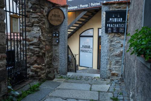 an entrance to a building with a glass door at Pivovar Prachatice in Prachatice