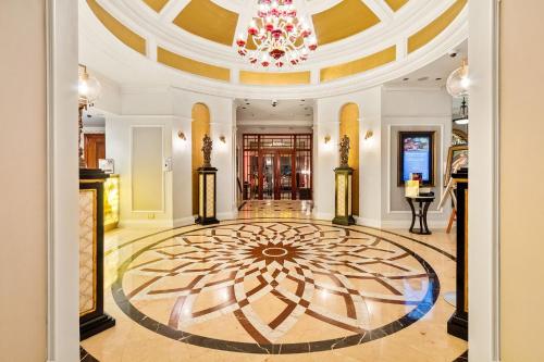 a lobby with a large rug on the floor at Taj Hotel 305 by Host Agents in Cape Town