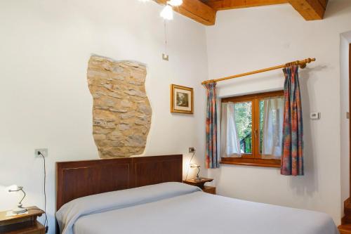 Katil atau katil-katil dalam bilik di Al Ciod Agriturismo